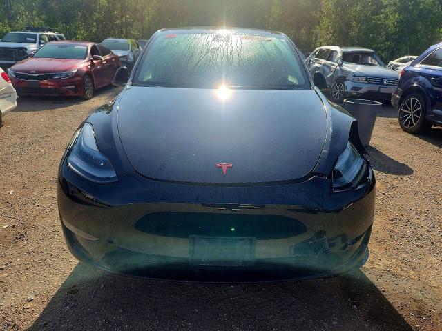 2023 Tesla Model y VIN LRWYGDEE0PC105007 COPART salvage auction — FRONT END, ON - PERMIT NO BRAND - UNFIT, sold $16,950 on 2026-08-18 (photo 5)