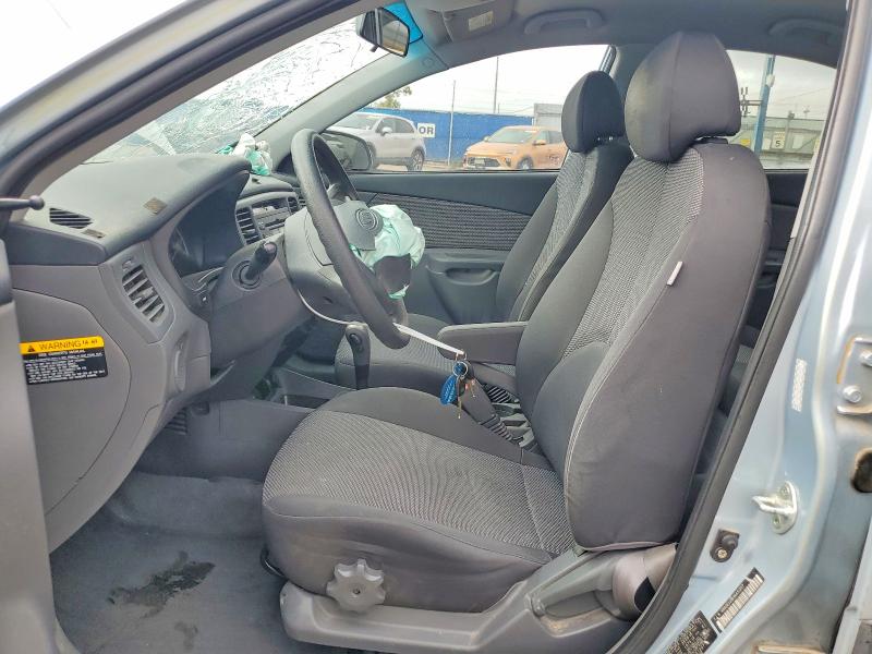 2009 Kia Rio VIN KNADE223X96451207 COPART salvage auction — FRONT END, TX - SALVAGE VEHICLE TITLE (P), sold $125 on 2026-07-31 (photo 7)