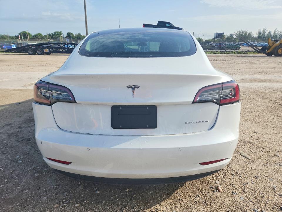 2021 Tesla Model 3 VIN 5YJ3E1EBXMF915038 COPART salvage auction — REAR END, Fl - Cert Of Title Slvg Rebuildable, sold $6,200 on 2026-07-28 (photo 6)