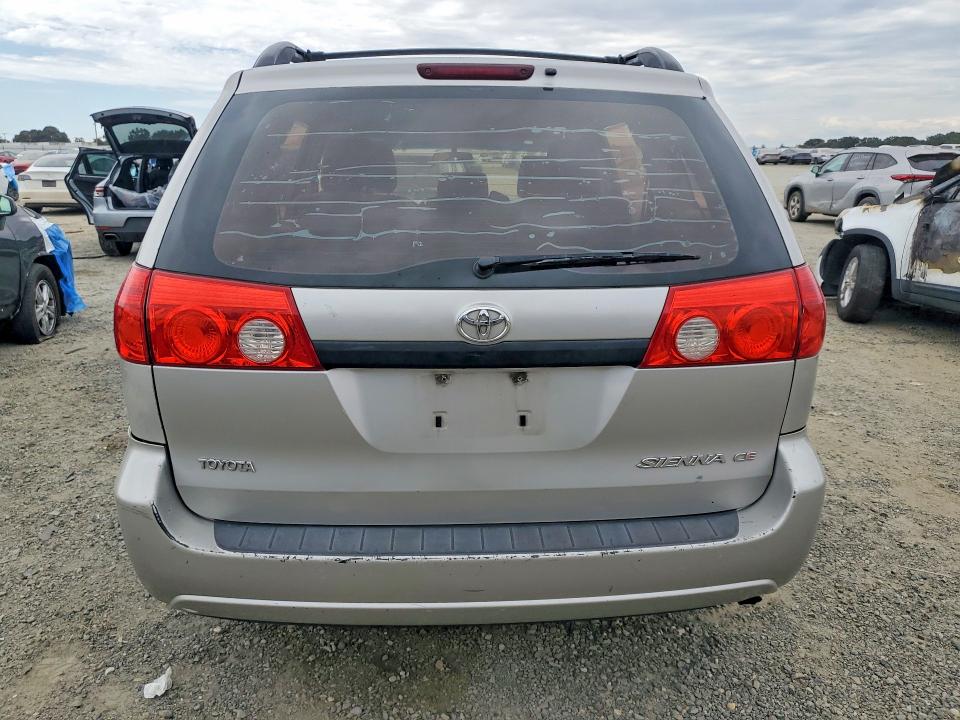 2010 Toyota Sienna VIN 5TDKK4CCXAS316553 COPART salvage auction — REAR END, CA - SALVAGE CERTIFICATE, sold $15 on 2026-07-28 (photo 6)