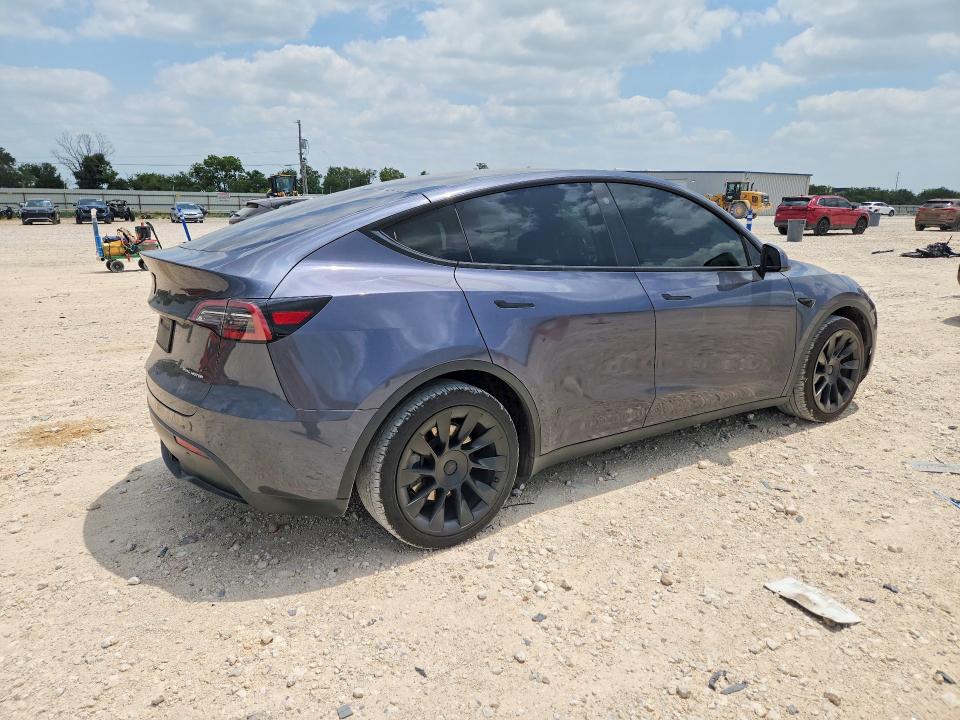 2021 Tesla Model y VIN 5YJYGDEE9MF149038 COPART salvage auction — NORMAL WEAR, TX - CERT OF TITLE-REBUILT SALVAGE, sold $9,900 on 2026-08-03 (photo 3)