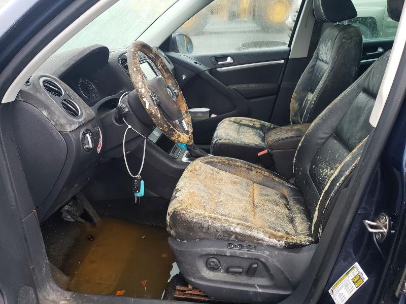 2014 Volkswagen Tiguan VIN WVGJV3AXXEW624990 COPART salvage auction — WATER/FLOOD, Ns - Cert Of Registration, sold $225 on 2026-08-13 (photo 7)