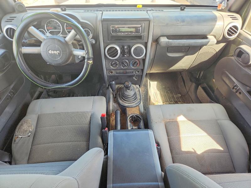 2008 Jeep Wrangler unlimited VIN 1J4GA59198L520500 COPART salvage auction — NORMAL WEAR, IN - CERTIFICATE OF TITLE, sold $2,472 on 2026-07-09 (photo 8)