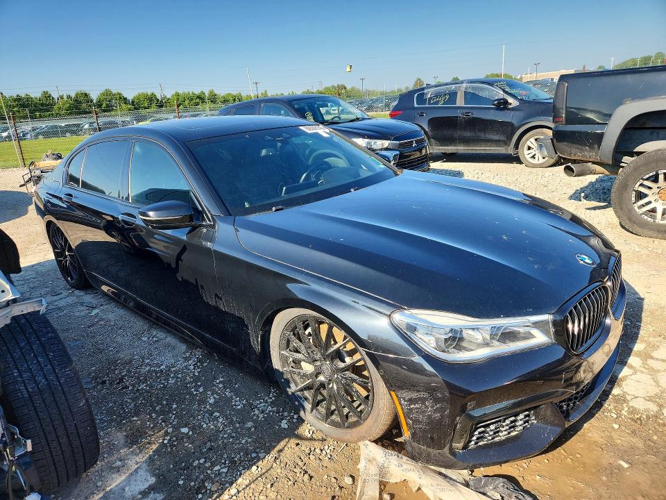 2018 BMW 7er VIN WBA7F2C50JG424686 COPART salvage auction — MINOR DENT/SCRATCHES, Wv - Certificate Of Title (P), sold $9,000 on 2026-07-24 (photo 4)