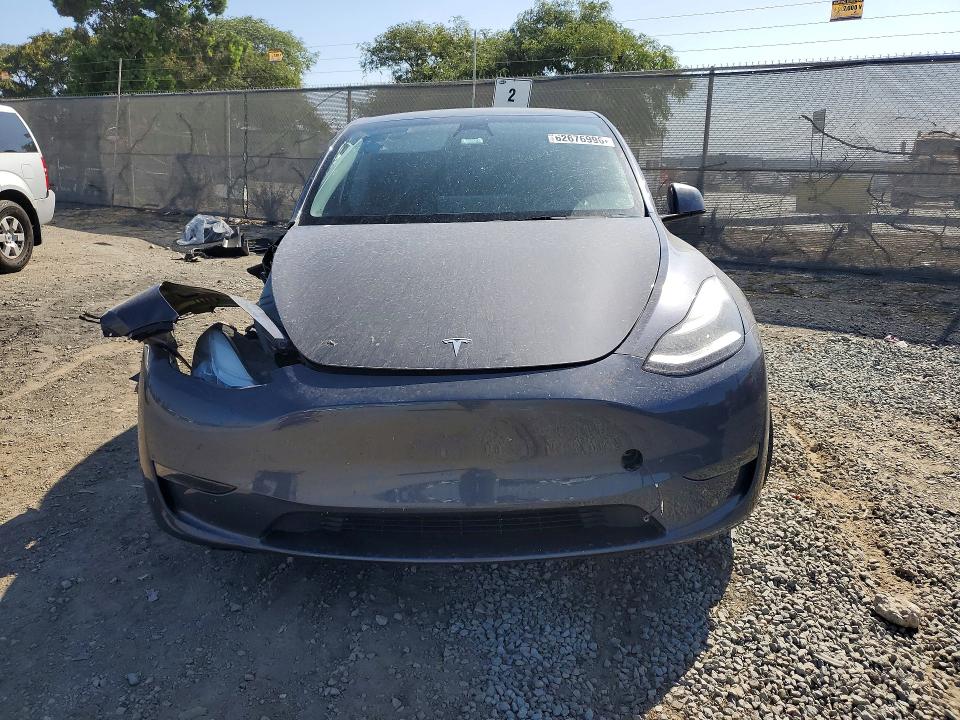 2023 Tesla Model y VIN 7SAYGDEE4PA113102 COPART salvage auction — FRONT END, Ca - Salvage Certificate, sold $8,100 on 2026-08-28 (photo 5)