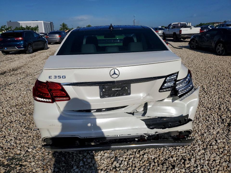2014 Mercedes-benz E-klasse VIN WDDHF5KB6EA885793 COPART salvage auction — REAR END, Fl - Cert Of Title Slvg Rebuildable, sold $3,600 on 2026-08-07 (photo 6)