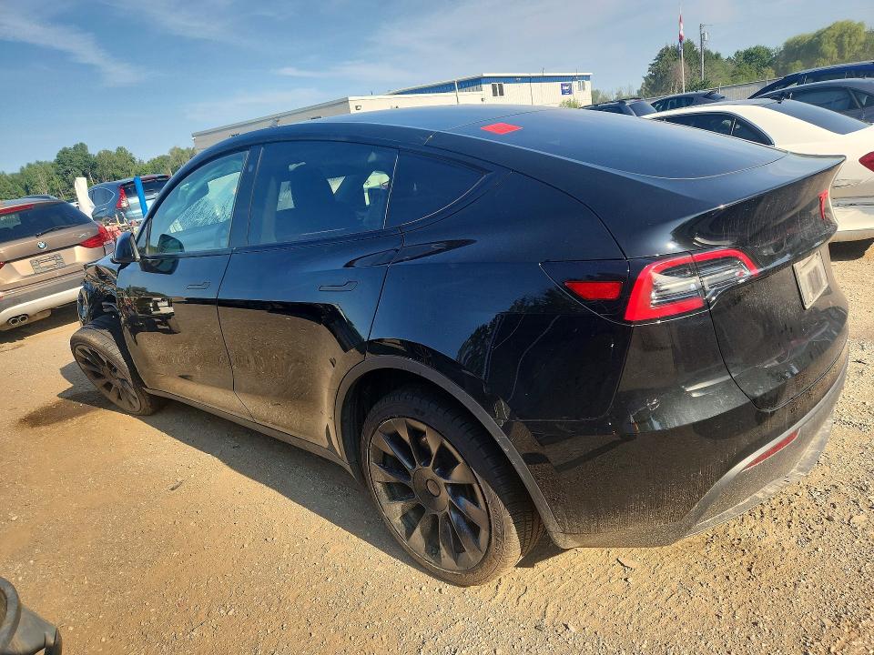 2023 Tesla Model y VIN LRWYGDEE0PC105007 COPART salvage auction — FRONT END, ON - PERMIT NO BRAND - UNFIT, sold $16,950 on 2026-08-18 (photo 2)