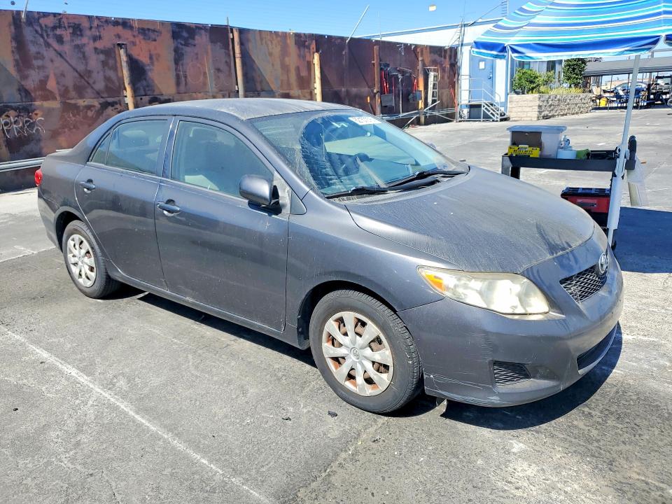 2009 Toyota Corolla VIN JTDBL40E599021289 COPART salvage auction — NORMAL WEAR, Fl - Dis/Dlr/Exp Only Clean Title, sold $2,050 on 2026-07-29 (photo 4)