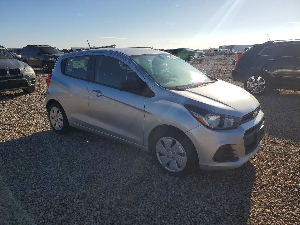 2016 Chevrolet Spark VIN KL8CA6SA0GC569337 COPART salvage auction — SIDE, Tx - Salvage Vehicle Title, sold $425 on 2026-07-28 (photo 4)
