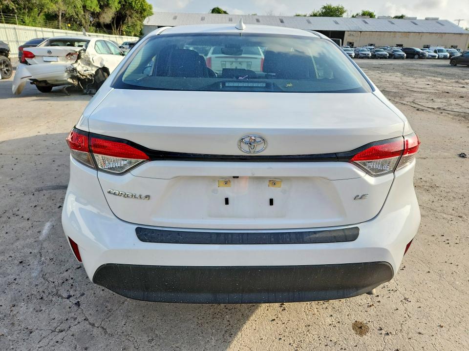 2025 Toyota Corolla VIN 5YFB4MDEXSP260893 COPART salvage auction — SIDE, Tx - Salvage Vehicle Title, sold $8,700 on 2026-08-25 (photo 6)
