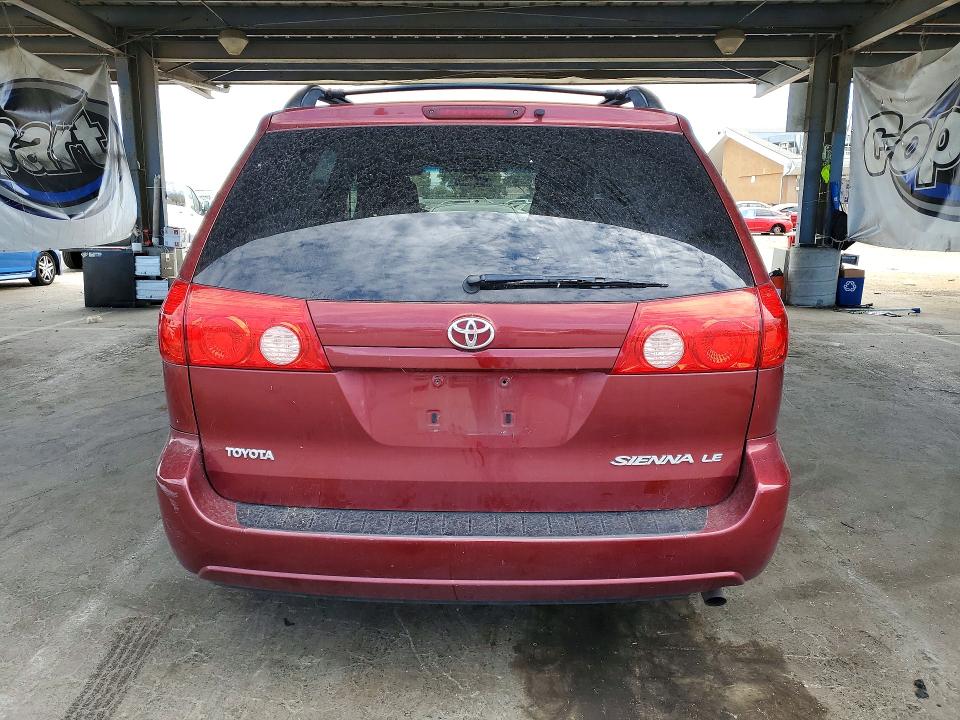 2010 Toyota Sienna VIN 5TDKK4CC3AS314076 COPART salvage auction — MINOR DENT/SCRATCHES, CA - DIS/DLR/EXP APP FOR DUP CLEAN, sold $30 on 2026-07-28 (photo 6)