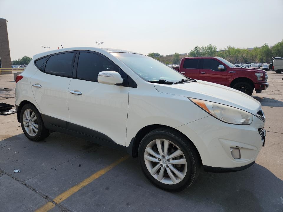 2011 Hyundai Tucson VIN KM8JUCAC0BU120178 COPART salvage auction — HAIL, CO - CERTIFICATE OF TITLE, sold $1,650 on 2026-07-29 (photo 4)
