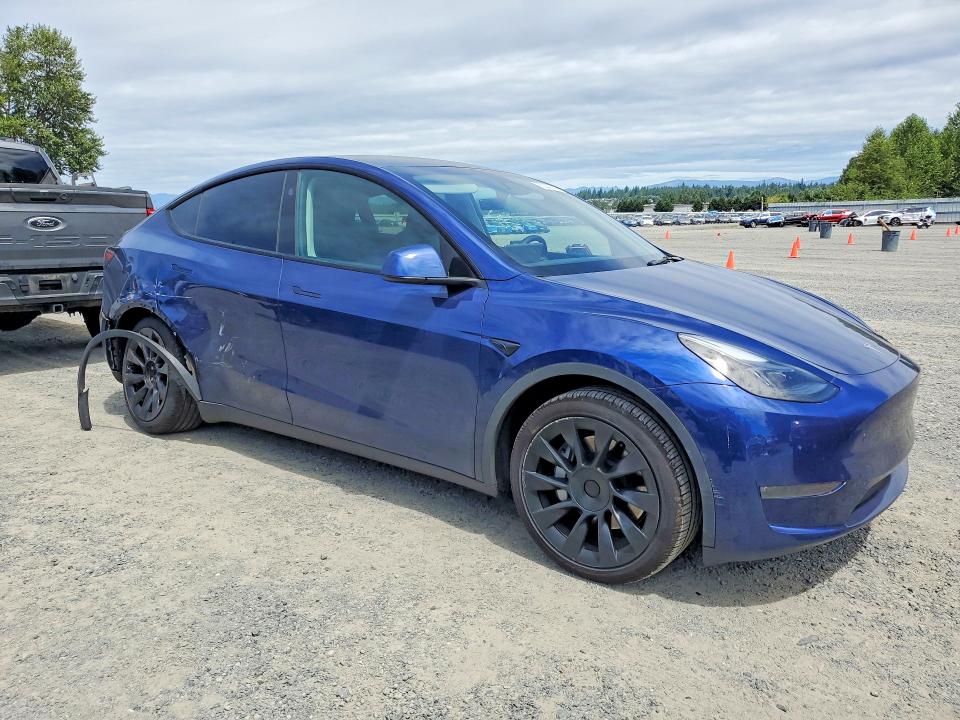2023 Tesla Model y VIN 7SAYGDEEXPA186216 COPART salvage auction — SIDE, WA - BILL OF SALE, sold $16,000 on 2026-08-03 (photo 4)