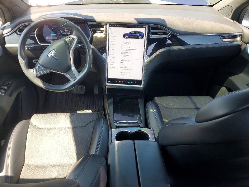 2017 Tesla Model x VIN 5YJXCBE24HF054703 COPART salvage auction — MINOR DENT/SCRATCHES, Tx - Certificate Of Title, sold $7,300 on 2026-07-31 (photo 8)