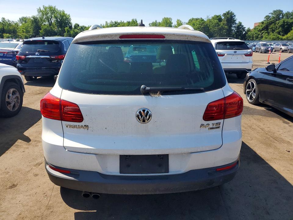 2014 Volkswagen Tiguan VIN WVGBV3AX2EW523382 COPART salvage auction — MINOR DENT/SCRATCHES, Ct - Certificate Of Title, sold $800 on 2026-07-28 (photo 6)