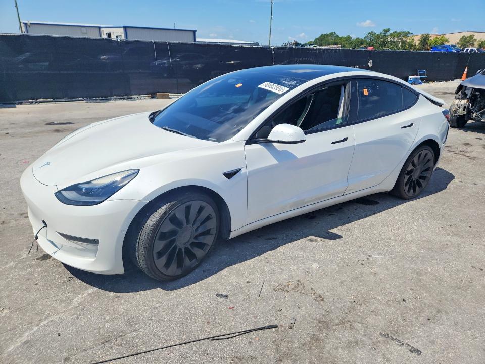 2021 Tesla Model 3 VIN 5YJ3E1ECXMF088456 COPART salvage auction — REAR END, Fl - Certificate Of Title, sold $5,100 on 2026-07-28 (photo 1)