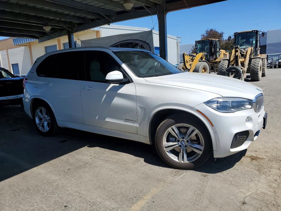 2018 BMW X5 VIN 5UXKT0C52J0V99524 COPART salvage auction — MINOR DENT/SCRATCHES, CO - DIS/DLR/EXP ONLY CLEAN TITLE, sold $11,100 on 2026-07-27 (photo 4)