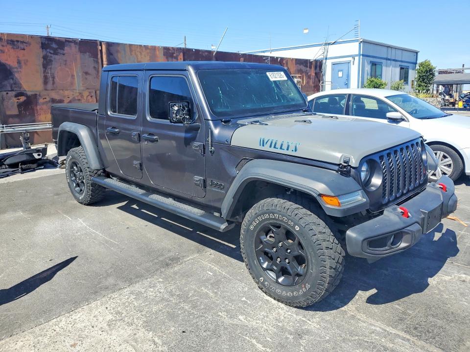 2020 Jeep Gladiator VIN 1C6HJTAG5LL151567 COPART salvage auction — NORMAL WEAR, Hi - Dis/Dlr/Exp Only Salvage Title, sold $8,200 on 2026-07-29 (photo 4)