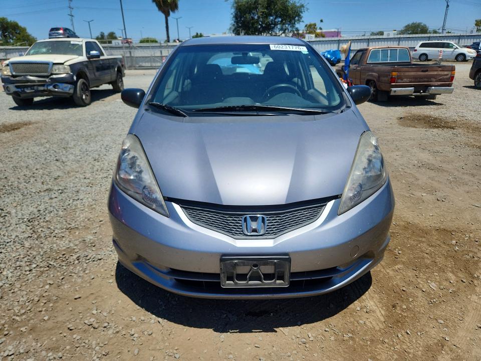 2009 Honda Fit VIN JHMGE88209C002068 COPART salvage auction — FRONT END, CA - DIS/DLR/EXP ONLY CLEAN TITLE, sold $800 on 2026-07-10 (photo 5)