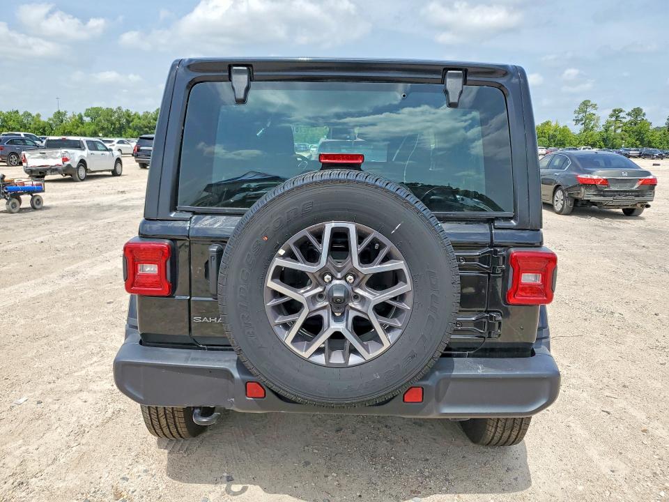 2026 Jeep Wrangler / VIN 1C4PJXENXTW194384 COPART salvage auction — ALL OVER, FL - CERT OF TITLE SLVG REBUILDABLE, sold $15,100 on 2026-07-28 (photo 6)