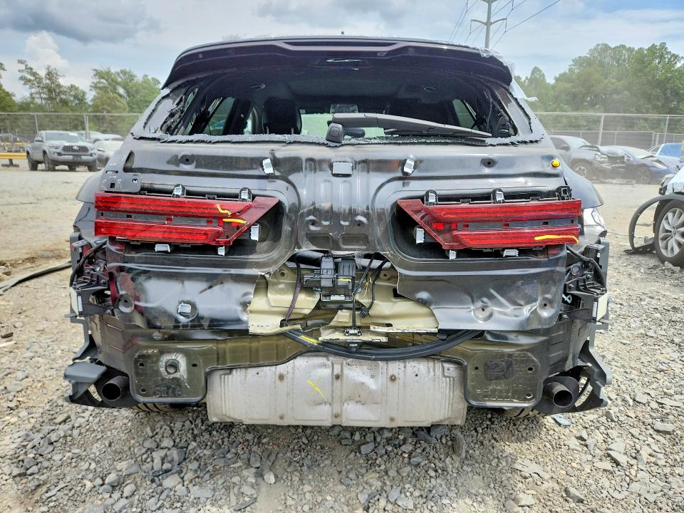 2023 Genesis Gv70 VIN KMUMADTB4PU128680 COPART salvage auction — REAR END, Md - Cert Of Salvage > 75% Damage, sold $14,200 on 2026-09-04 (photo 6)