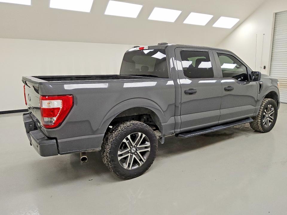 2021 Ford F-150 lightning VIN 1FTFW1E52MKD65101 COPART salvage auction — MINOR DENT/SCRATCHES, TX - CERTIFICATE OF TITLE, sold $14,600 on 2026-07-23 (photo 3)