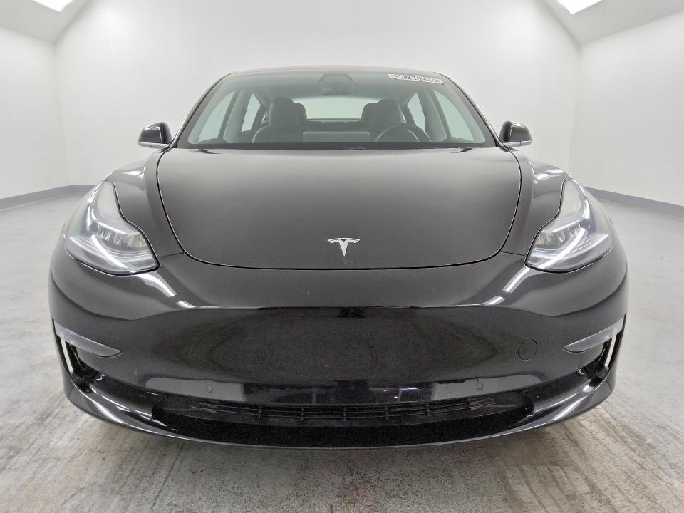 2018 Tesla Model 3 VIN 5YJ3E1EA8JF013863 COPART salvage auction — MINOR DENT/SCRATCHES, CA - CERTIFICATE OF TITLE, sold $14,700 on 2026-07-28 (photo 5)