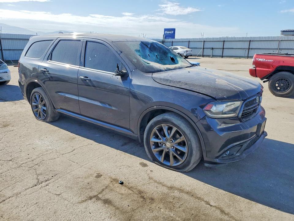 2014 Dodge Durango VIN 1C4RDJAG9EC978998 COPART salvage auction — VANDALISM, Ca - Salvage Certificate, sold $2,100 on 2026-08-21 (photo 4)