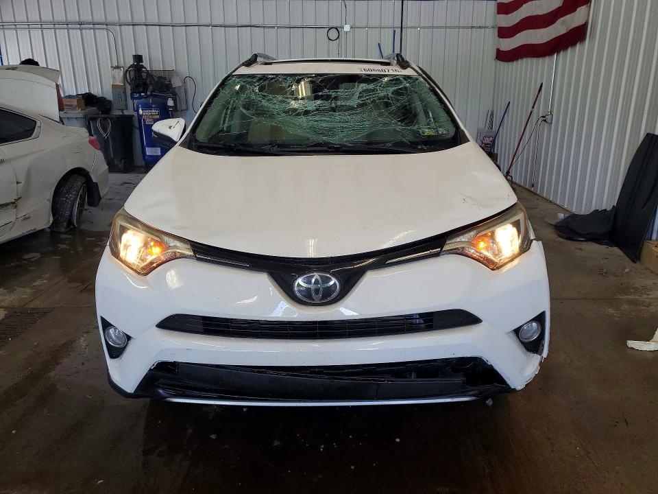 2017 Toyota Rav 4 VIN JTMRFREV5HJ144728 COPART salvage auction — ROLLOVER, Pa - Certificate Of Salvage, sold $525 on 2026-07-29 (photo 5)