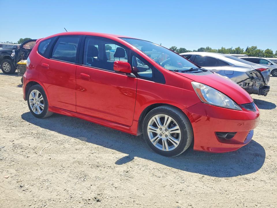 2011 Honda Fit VIN JHMGE8H58BC011827 COPART salvage auction — MINOR DENT/SCRATCHES, CA - SALVAGE CERTIFICATE, sold $2,300 on 2026-07-09 (photo 4)