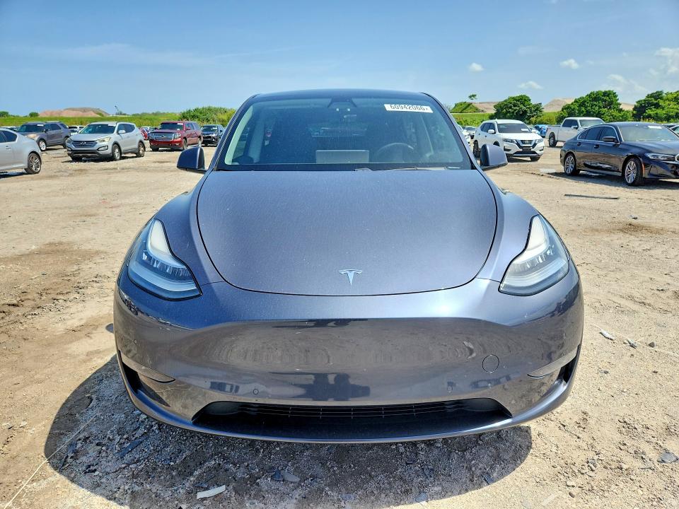 2020 Tesla Model y VIN 5YJYGDEF8LF011434 COPART salvage auction — MINOR DENT/SCRATCHES, FL - CERT OF TITLE SLVG REBUILDABLE, sold $11,100 on 2026-07-23 (photo 5)