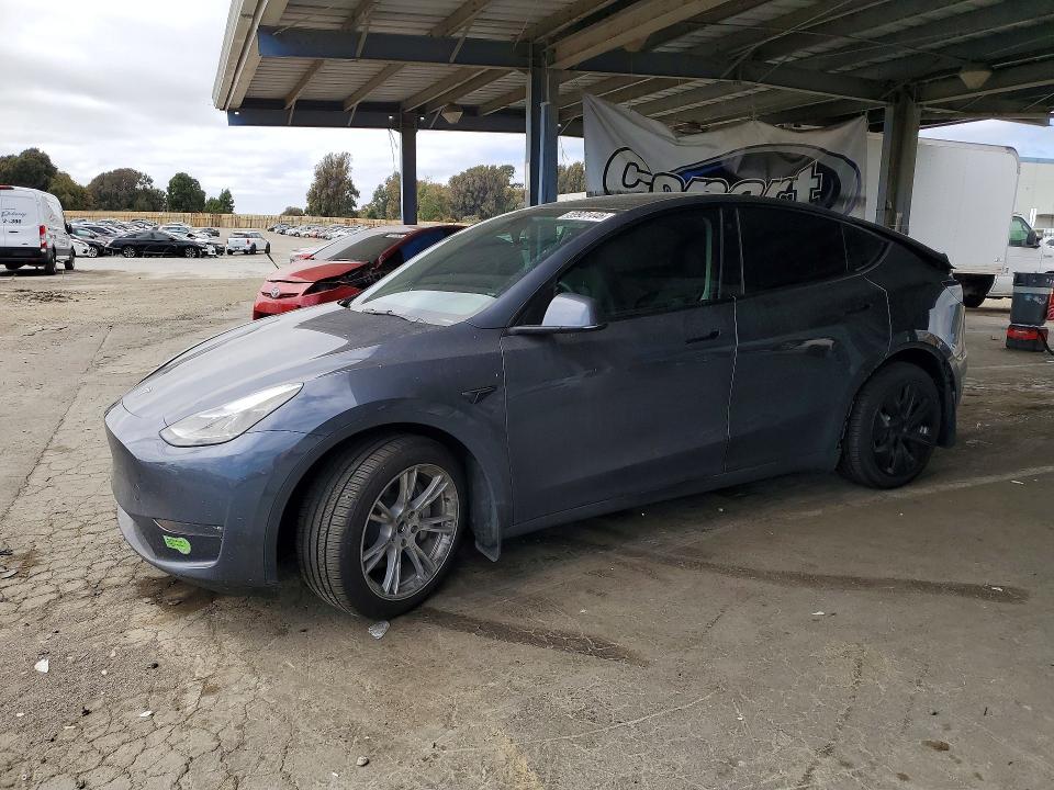 2023 Tesla Model y VIN 7SAYGDEE5PF635305 COPART salvage auction — REAR END, Ca - Salvage Certificate, sold $7,600 on 2026-07-14 (photo 1)