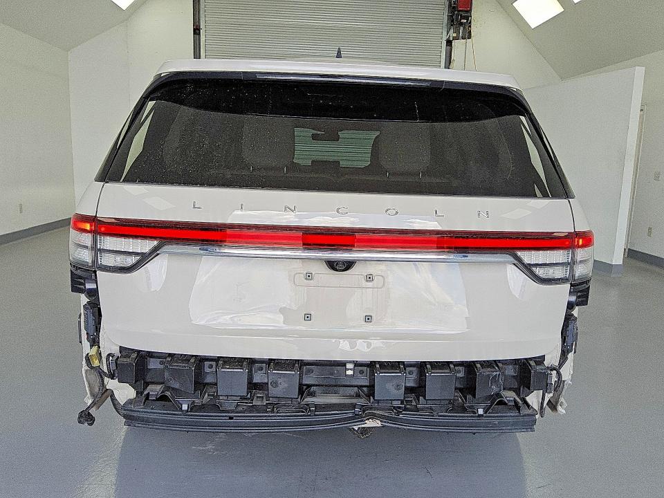 2023 Lincoln Aviator VIN 5LMYJ8XY1PNL01747 COPART salvage auction — REAR END, TX - CERTIFICATE OF TITLE, sold $29,250 on 2026-07-16 (photo 6)