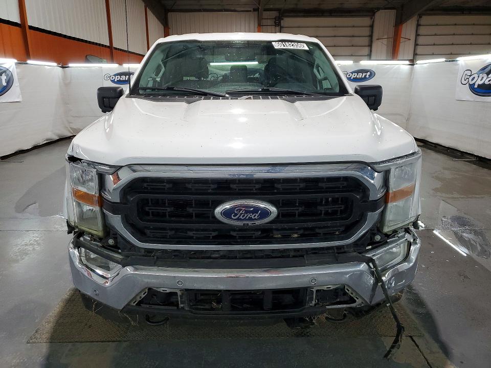 2021 Ford F-150 lightning VIN 1FTFW1E86MFC10845 COPART salvage auction — MINOR DENT/SCRATCHES, AB - BOS - ACTIVE, sold $9,100 on 2026-07-29 (photo 5)