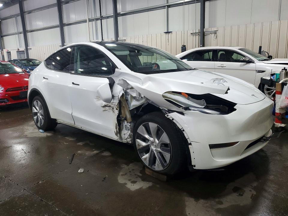 2023 Tesla Model y VIN 7SAYGDEE7PA086381 COPART salvage auction — SIDE, Mn - Cert Of Title-Salvage, sold $3,700 on 2026-08-18 (photo 4)