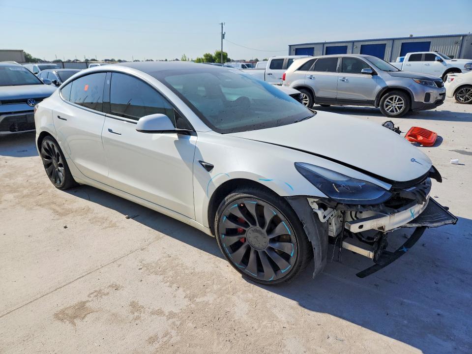 2021 Tesla VIN 5YJ3E1EC3MF973341 COPART salvage auction — FRONT END, TX - SALVAGE VEHICLE TITLE (P), sold $5,700 on 2026-07-31 (photo 4)
