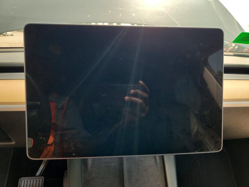 2023 Tesla Model y VIN 7SAYGDEF5PA049323 COPART salvage auction — NORMAL WEAR, MO - CERTIFICATE OF TITLE, sold $9,000 on 2026-07-28 (photo 9)