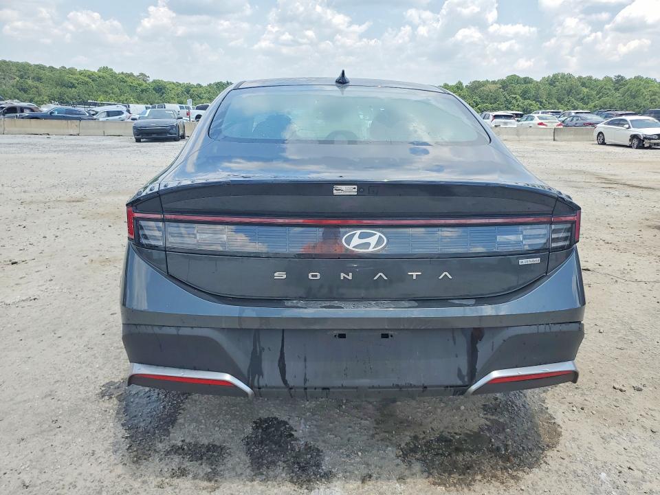 2026 Hyundai Sonata hybrid VIN KMHL24JJ6TA144538 COPART salvage auction — SIDE, FL - CERT OF TITLE SLVG REBUILDABLE, sold $11,500 on 2026-07-15 (photo 6)