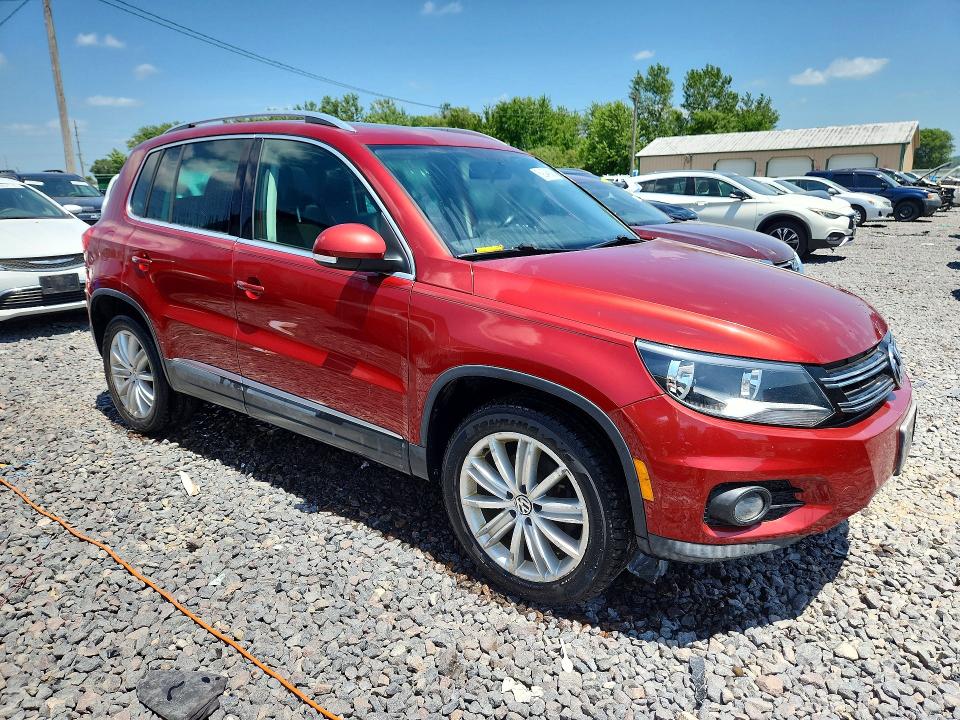 2013 Volkswagen Tiguan VIN WVGAV3AX9DW085924 COPART salvage auction — WATER/FLOOD, IL - SALVAGE CERT-FLOOD, sold $200 on 2026-08-03 (photo 4)