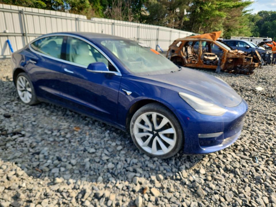 2019 Tesla Model 3 VIN 5YJ3E1EB8KF450918 COPART salvage auction — REAR END, Nc - Salvage Cert-Rebuilt (P), sold $8,900 on 2026-07-27 (photo 4)