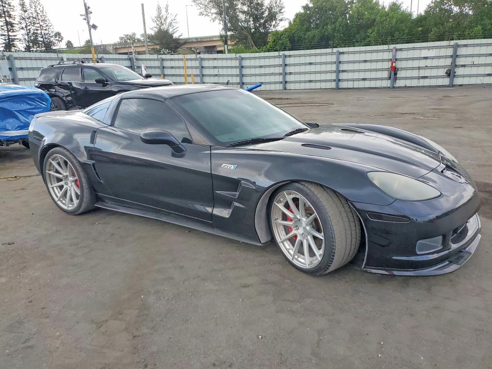 2009 Chevrolet Corvette VIN 1G1YY26W695109574 COPART salvage auction — NORMAL WEAR, FL - CERT OF TITLE-REBUILT, sold $15,100 on 2026-07-29 (photo 4)