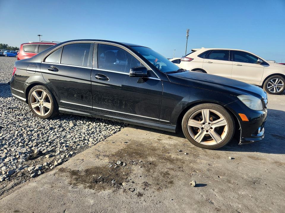 2010 Mercedes-benz C class VIN WDDGF8BB7AF424452 COPART salvage auction — WATER/FLOOD, FL - CERT OF TITLE-SLVG REBLD FLOOD, sold $425 on 2026-08-10 (photo 4)