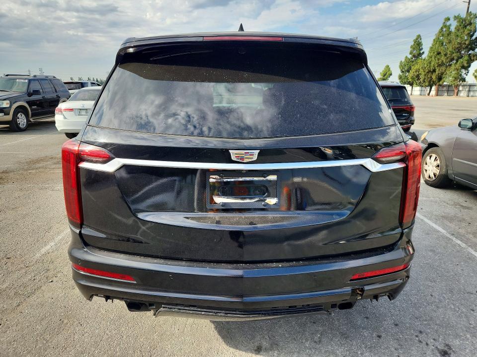 2021 Cadillac Xt6 VIN 1GYKPDRS1MZ226866 COPART salvage auction — REAR END, Tx - Salvage Vehicle Title (P), sold $9,600 on 2026-07-28 (photo 6)