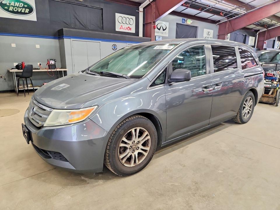 2012 Honda Odyssey VIN 5FNRL5H6XCB050690 COPART salvage auction — SIDE, MA - CERTIFICATE OF TITLE (P), sold $2,100 on 2026-07-21 (photo 1)