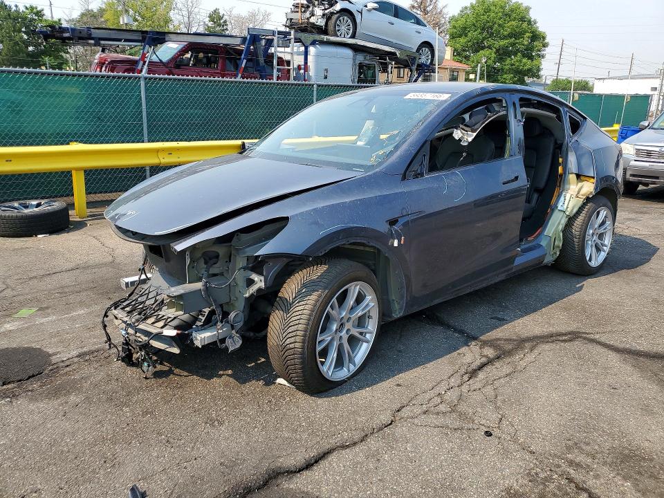 2023 Tesla Model y VIN 7SAYGDEF4PA049300 COPART salvage auction — ALL OVER, TX - DIS/DLR/EXP ONLY CLEAN TITLE (P), sold $7,700 on 2026-07-09 (photo 1)