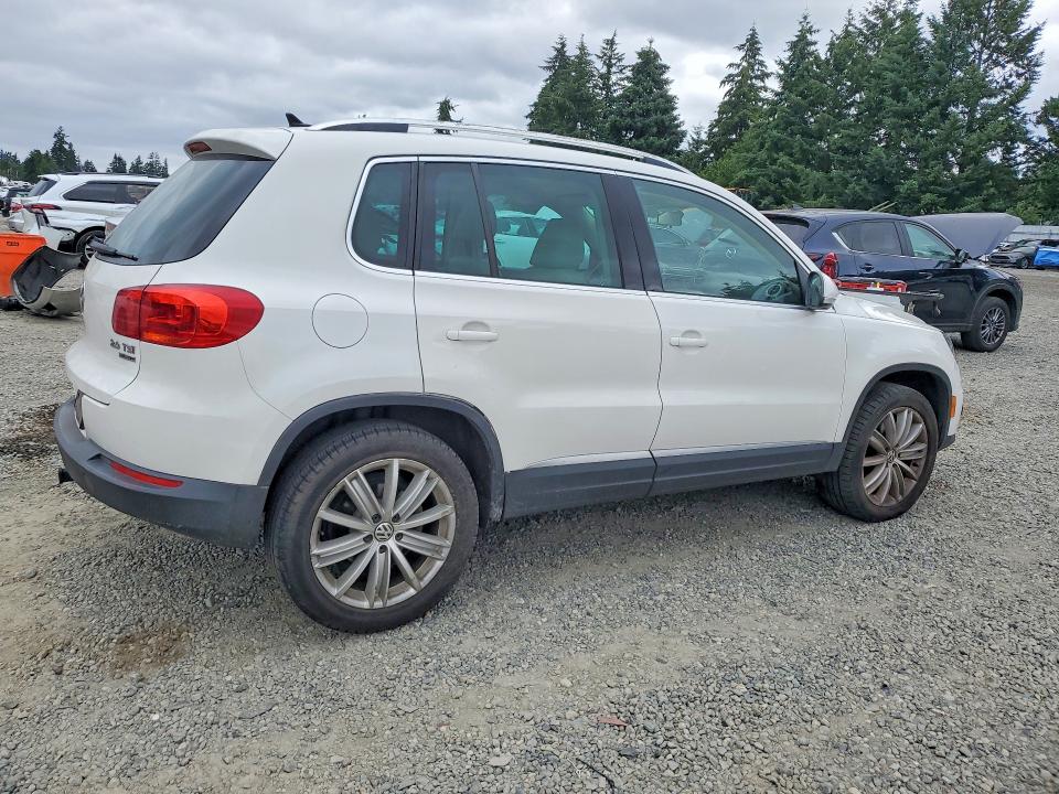 2012 Volkswagen Tiguan VIN WVGBV7AX8CW581906 COPART salvage auction — MINOR DENT/SCRATCHES, Wa - Vehicle Cert Of Ownership-Titl, sold $1,000 on 2026-07-14 (photo 3)