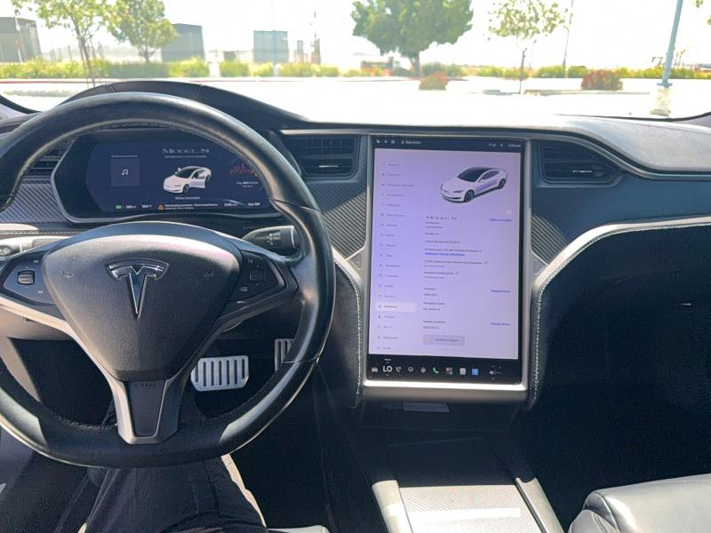 2021 Tesla Model s VIN 5YJSA1E47MF427870 COPART salvage auction — NORMAL WEAR, Ca - Dlr/Dis/Exp Only Salvage Title (P), sold $12,800 on 2026-07-16 (photo 9)
