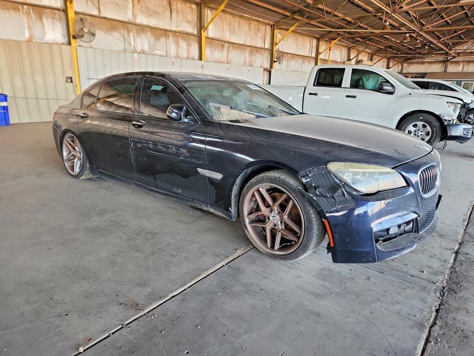 2015 BMW 7 series VIN WBAYE4C58FD139004 COPART salvage auction — NORMAL WEAR, Az - Certificate Of Title, sold $750 on 2026-07-29 (photo 4)