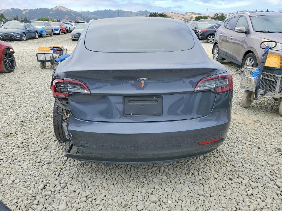 2021 Tesla Model 3 VIN 5YJ3E1EAXMF998770 COPART salvage auction — REAR END, Ca - Salvage Certificate, sold $7,200 on 2026-07-14 (photo 6)