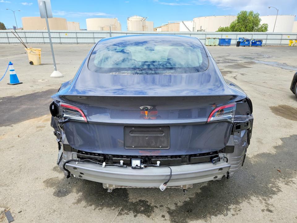 2023 Tesla Model 3 VIN 5YJ3E1EA4PF687985 COPART salvage auction — REAR END, CA - CERTIFICATE OF TITLE (P), sold $17,000 on 2026-07-27 (photo 6)